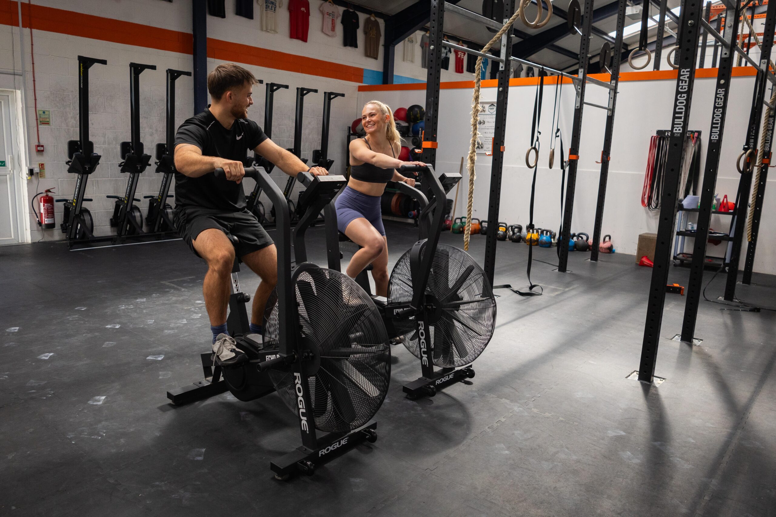 product-image-2 adam and holly on cross trainer bikes